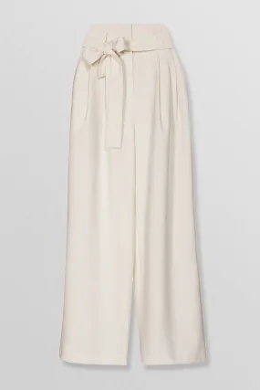 Belted cotton wide leg pleated pants in cream